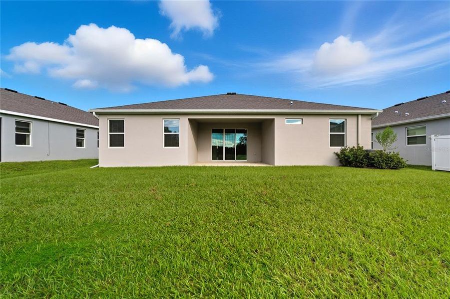 Exterior details and patio area of a home in , Dade City (Image 22).