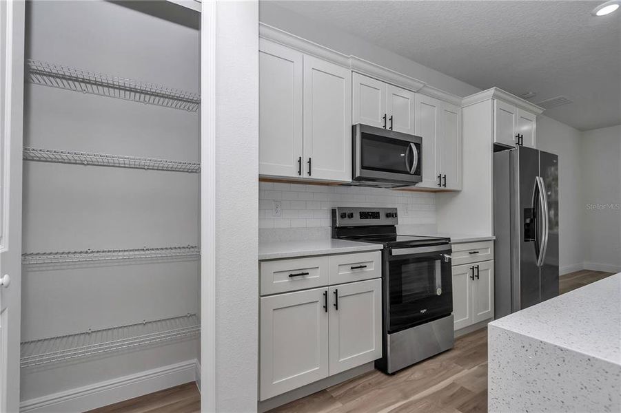 Furnished interior view inside a new home in , Dunnellon (Image 6).