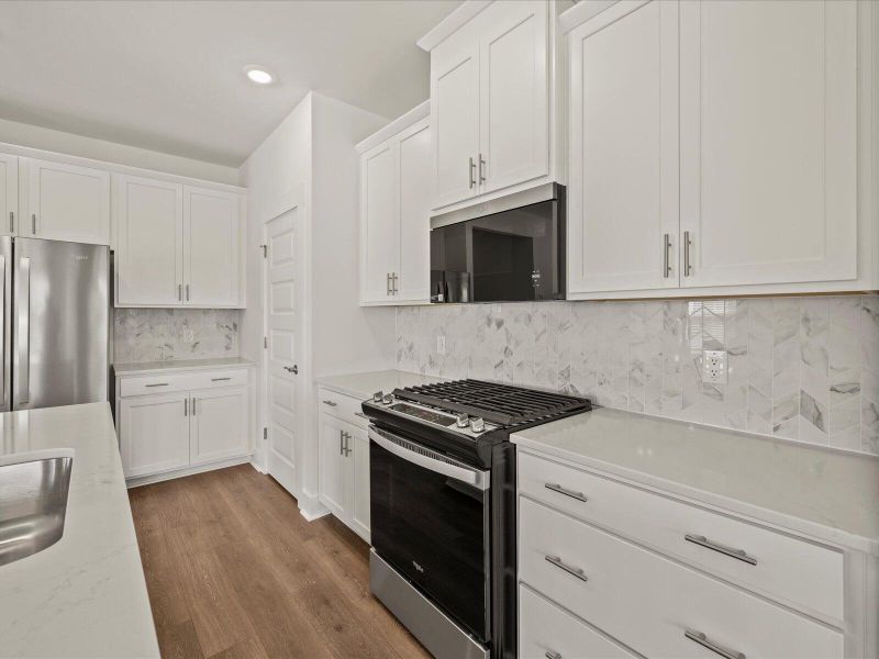Furnished interior view inside a new home in The Coves at Lakes of Cane Bay, Summerville (Image 11). Furnished interior view inside a new home in The Coves at Lakes of Cane Bay, Summerville (Image 11).