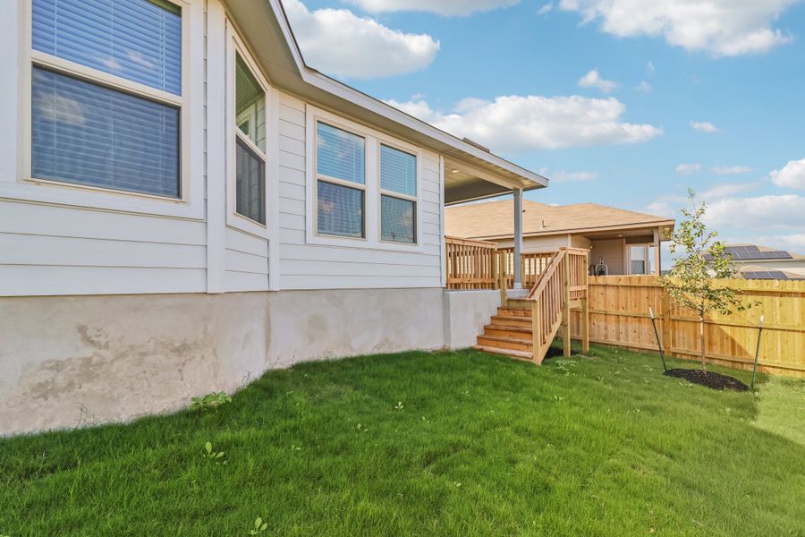 Back exterior of the Briscoe floorplan at a Meritage Homes community.