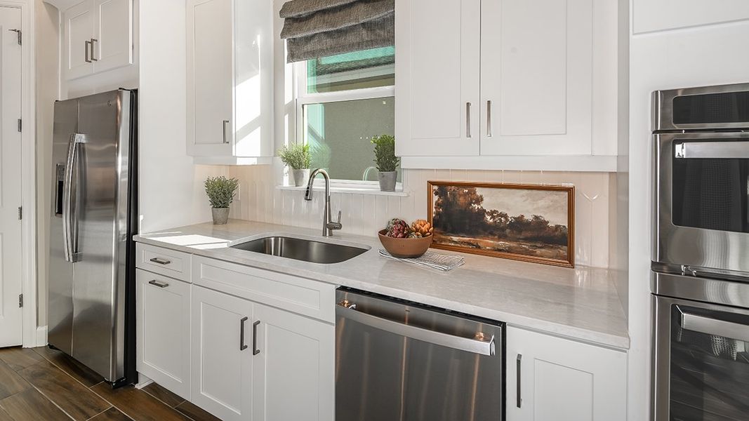 Representative furnished interior of a home built from the Lazio by Taylor Morrison in Esplanade at Center Lake Ranch, St. Cloud (Image 10).