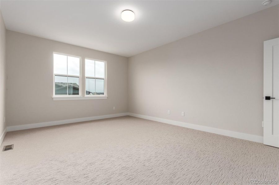 Spacious, unfurnished interior of a new home in West Grange, Longmont (Image 28).