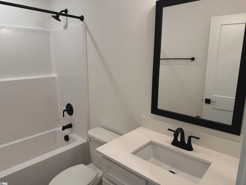 Furnished interior view inside a new home in Hidden Lake Estates, Greenville (Image 10).