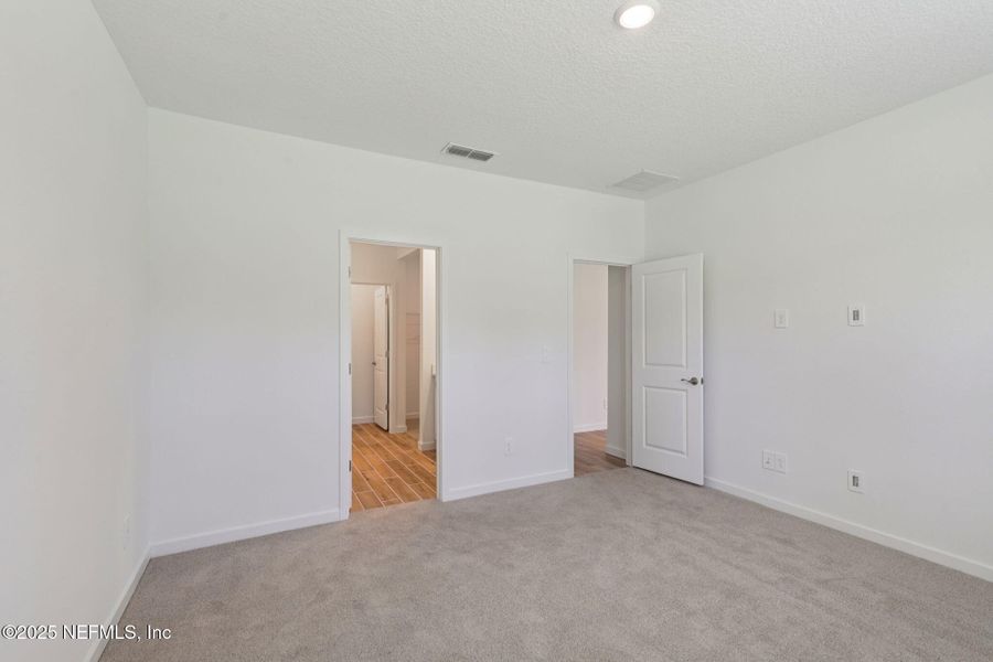 Spacious, unfurnished interior of a new home in Colbert Landings, Palm Coast (Image 21).