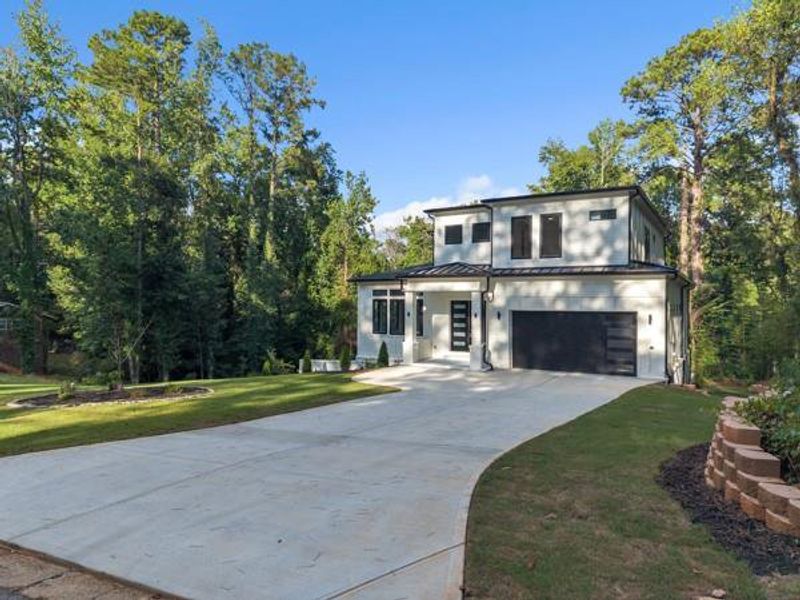 Front exterior of a new home in , Atlanta, GA, highlighting curb appeal (Image 33).