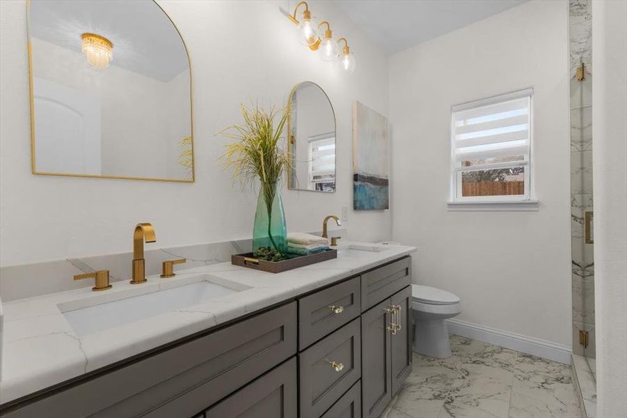 Bathroom with vanity and toilet