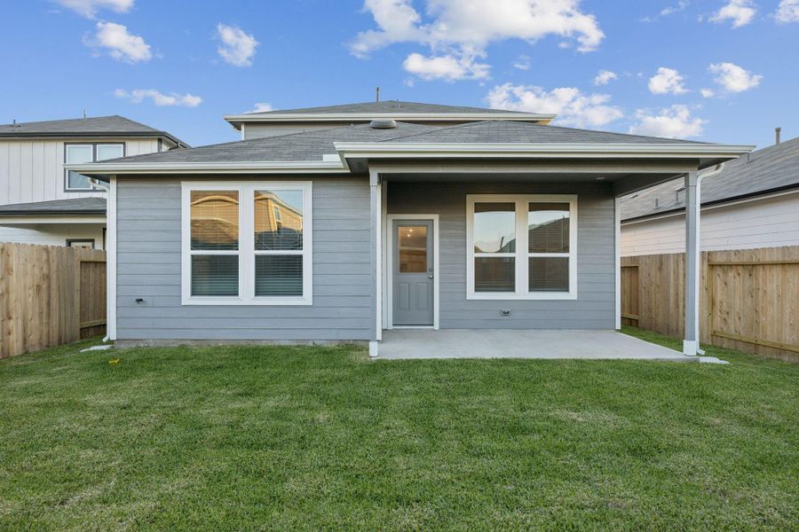 Exterior details and patio area of a home in Decker Farms, Magnolia (Image 3).
