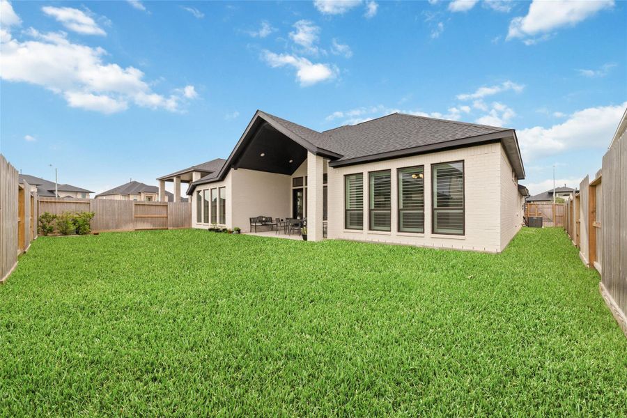 Exterior details and patio area of a home in Cross Creek Ranch, Fulshear (Image 24).