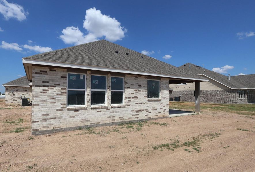 Backyard with covered patio - still under construction!