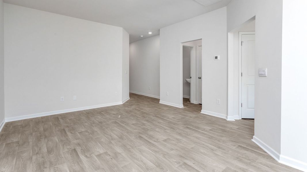 Representative unfurnished interior of a home built from the NEWTON by D.R. Horton in Henley Ridge, Graham (Image 9).