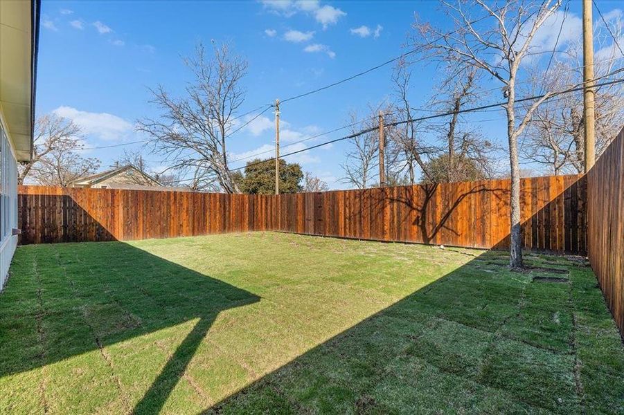 View of yard with a fenced backyard