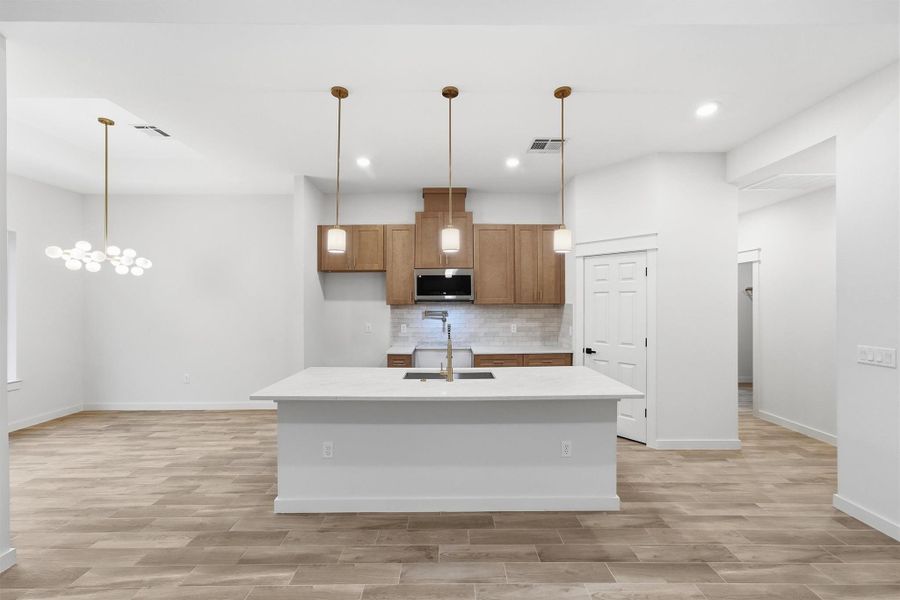 Furnished interior view inside a new home in , Conroe (Image 5).