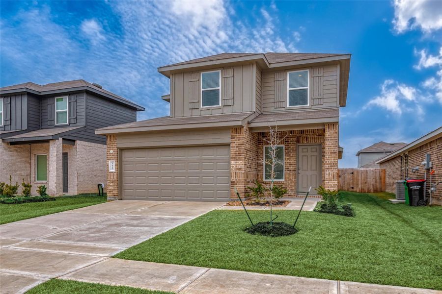 Front exterior of a new home in Breckenridge Forest, Spring, TX, highlighting curb appeal (Image 22).