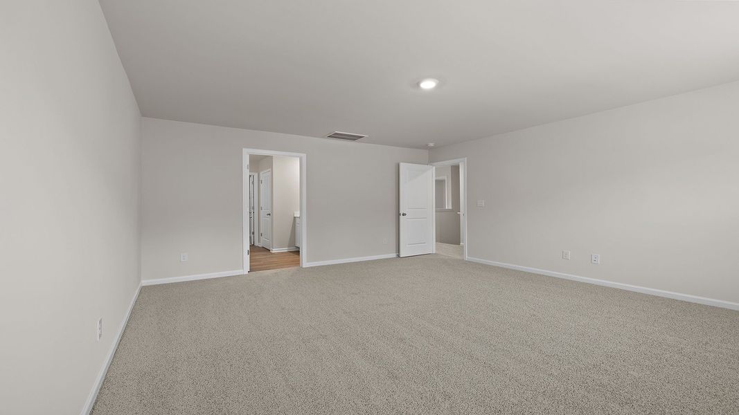 Spacious, unfurnished interior of a new home in Bentley Park, Greenwood (Image 27).