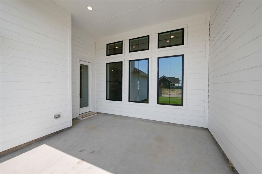 Exterior details and patio area of a home in MidTowne, Midlothian (Image 3). Exterior details and patio area of a home in MidTowne, Midlothian (Image 3).
