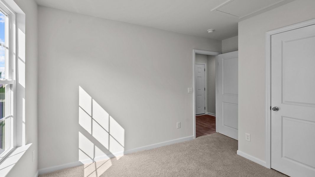Spacious, unfurnished interior of a new home in Hobbs Farm, Ayden (Image 11). Spacious, unfurnished interior of a new home in Hobbs Farm, Ayden (Image 11).