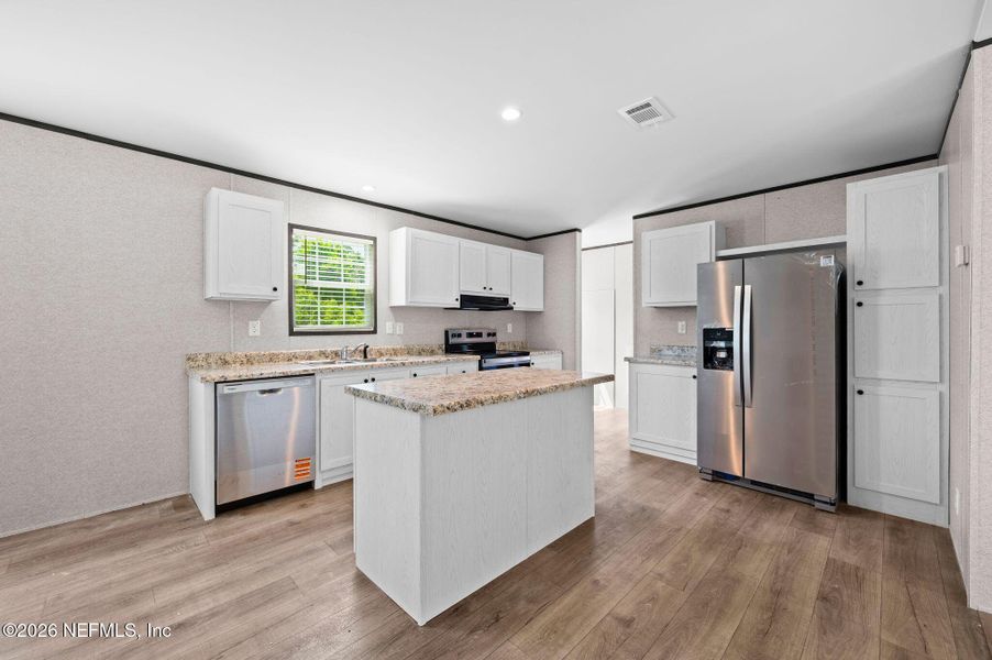 Furnished interior view inside a new home in , Lake City (Image 3).