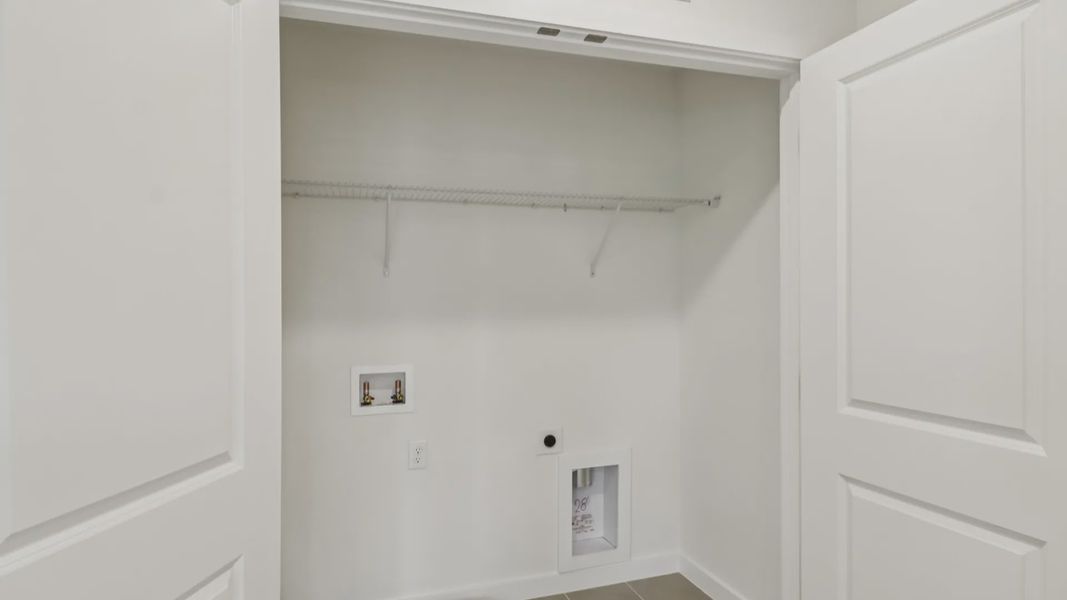 Furnished interior view inside a new home in Cyrene at Harmony, St. Cloud (Image 15).