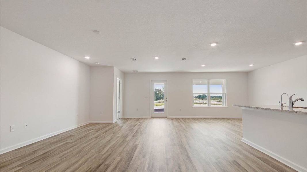 Spacious, unfurnished interior of a new home in Ashton Park Phase III, Freeport (Image 5).