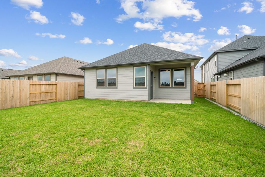 Covered Patio on the Cedar home plan by Trophy Signature Homes – REPRESENTATIVE PHOTO Covered Patio on the Cedar home plan by Trophy Signature Homes – REPRESENTATIVE PHOTO