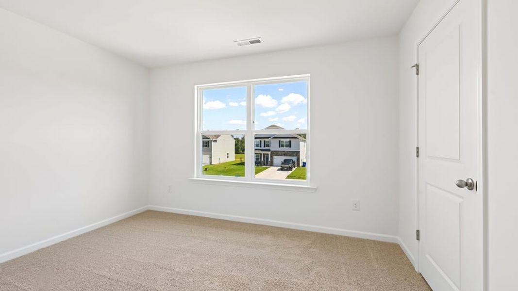 Spacious, unfurnished interior of a new home in Shahbain Reserve, Raeford (Image 36). Spacious, unfurnished interior of a new home in Shahbain Reserve, Raeford (Image 36).