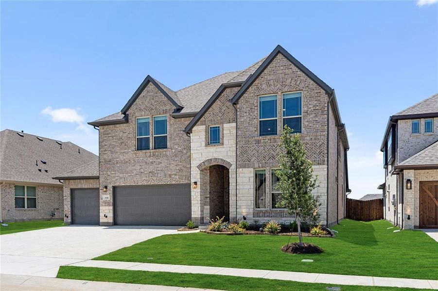 Front exterior of a new home in Chaparral Park, Oak Point, TX, highlighting curb appeal (Image 21). Front exterior of a new home in Chaparral Park, Oak Point, TX, highlighting curb appeal (Image 21).