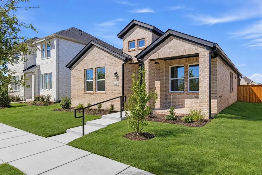 Front exterior of a new home in North Sky Celina, Celina, TX, highlighting curb appeal (Image 20). Front exterior of a new home in North Sky Celina, Celina, TX, highlighting curb appeal (Image 20).