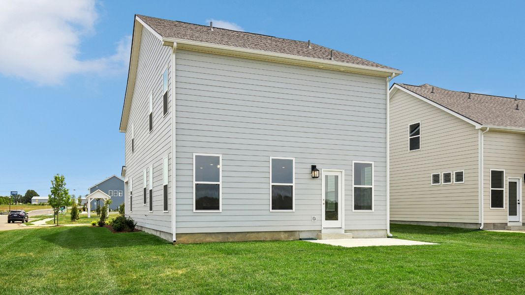 Large Backyard of home with small back patio