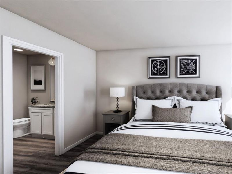 Bedroom featuring dark wood finished floors, baseboards, and connected bathroom