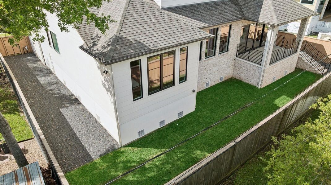 Exterior details and patio area of a home in , Houston (Image 26).