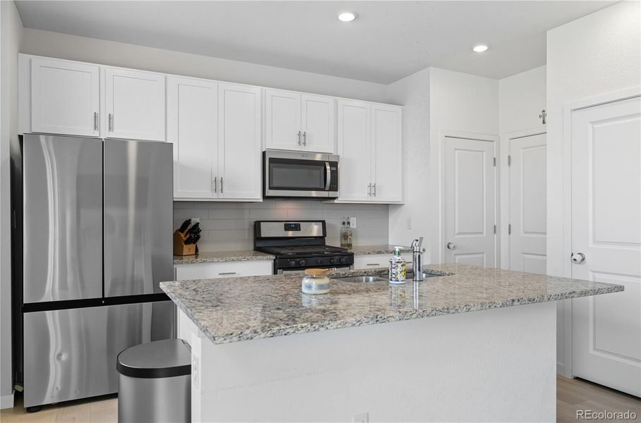Furnished interior view inside a new home in Ascent Village at Sterling Ranch - Single Family Homes, Littleton (Image 27). Furnished interior view inside a new home in Ascent Village at Sterling Ranch - Single Family Homes, Littleton (Image 27).