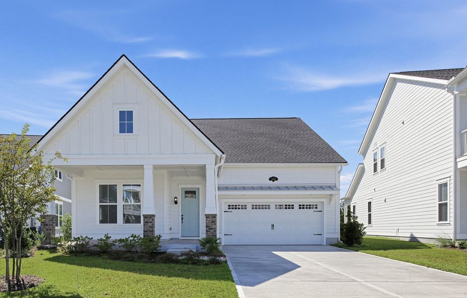 Front exterior of a new home in Beach View at Grande Dunes, Myrtle Beach, SC, highlighting curb appeal (Image 1). Front exterior of a new home in Beach View at Grande Dunes, Myrtle Beach, SC, highlighting curb appeal (Image 1).