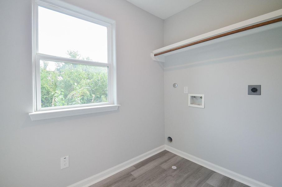 Huge space and dedicated laundry with storage and folding space—practical and tidy.