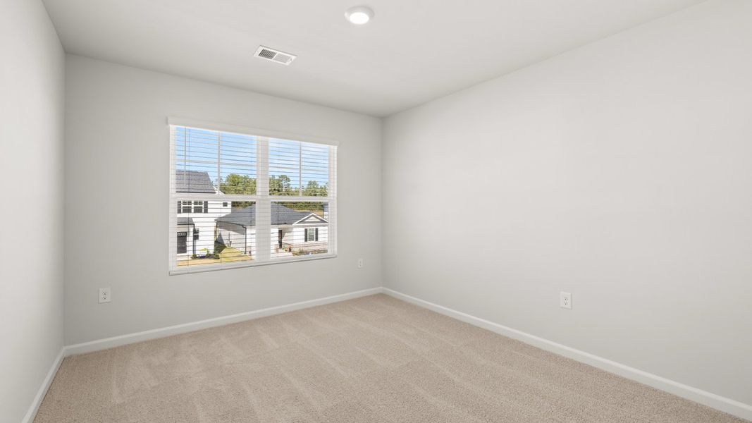 Spacious, unfurnished interior of a new home in Byrd Village, Graniteville (Image 26).