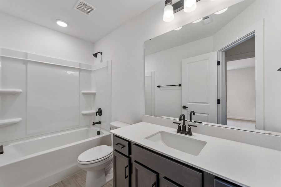 Representative furnished interior of a home built from the Arcadia by Hunter Quinn Homes in Westgate Village Townes, Spartanburg (Image 7). Representative furnished interior of a home built from the Arcadia by Hunter Quinn Homes in Westgate Village Townes, Spartanburg (Image 7).