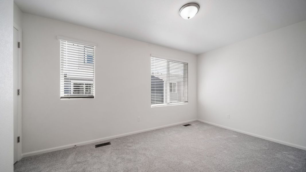 Spacious, unfurnished interior of a new home in Banning Lewis Ranch, Colorado Springs (Image 16).