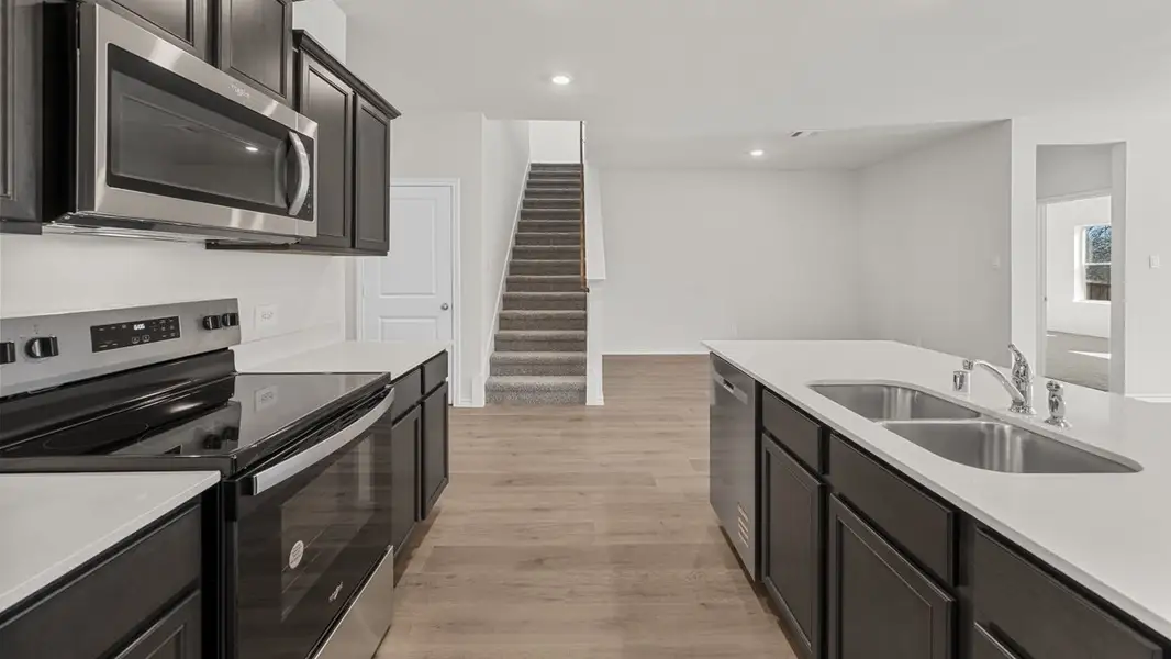 Furnished interior view inside a new home in Crane Crossing, Crandall (Image 3).