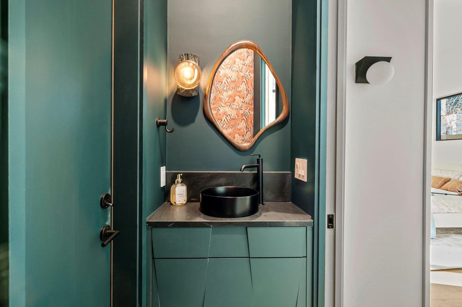 Powder bathroom with custom vanity and grasscloth wallpaper