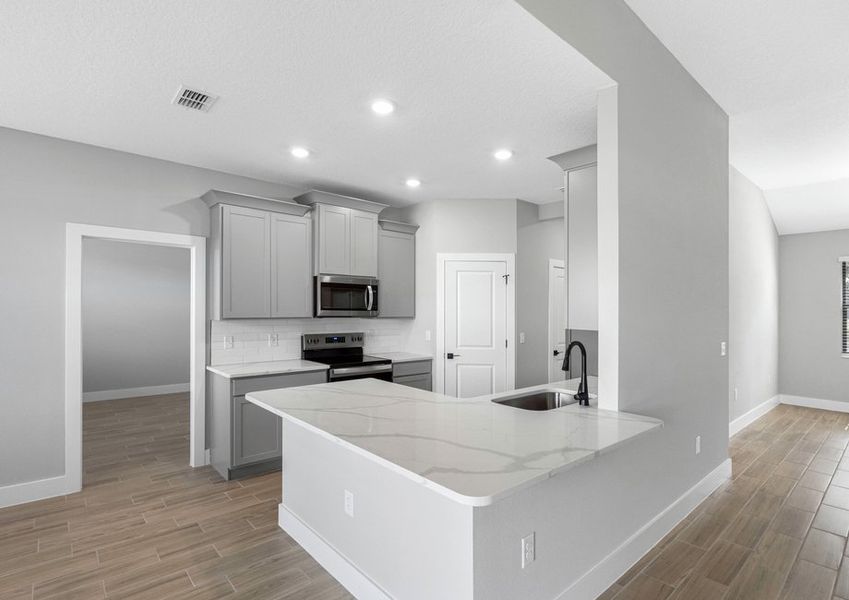 Never miss a moment in this gorgeous kitchen