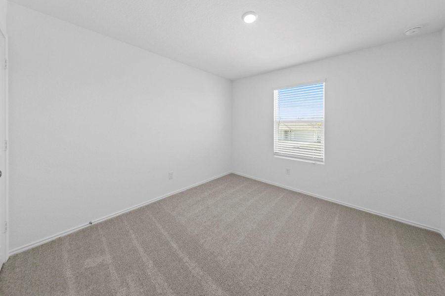 Unfurnished room with carpet floors and baseboards
