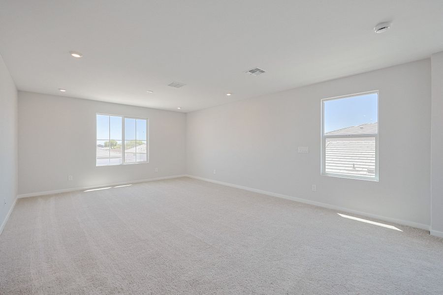 A room with a white wall and windows. A room with a white wall and windows.
