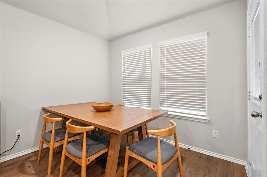 Dining room with wood finished floors and baseboards Dining room with wood finished floors and baseboards