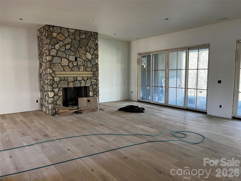 Large Living Room with statement stone fireplace