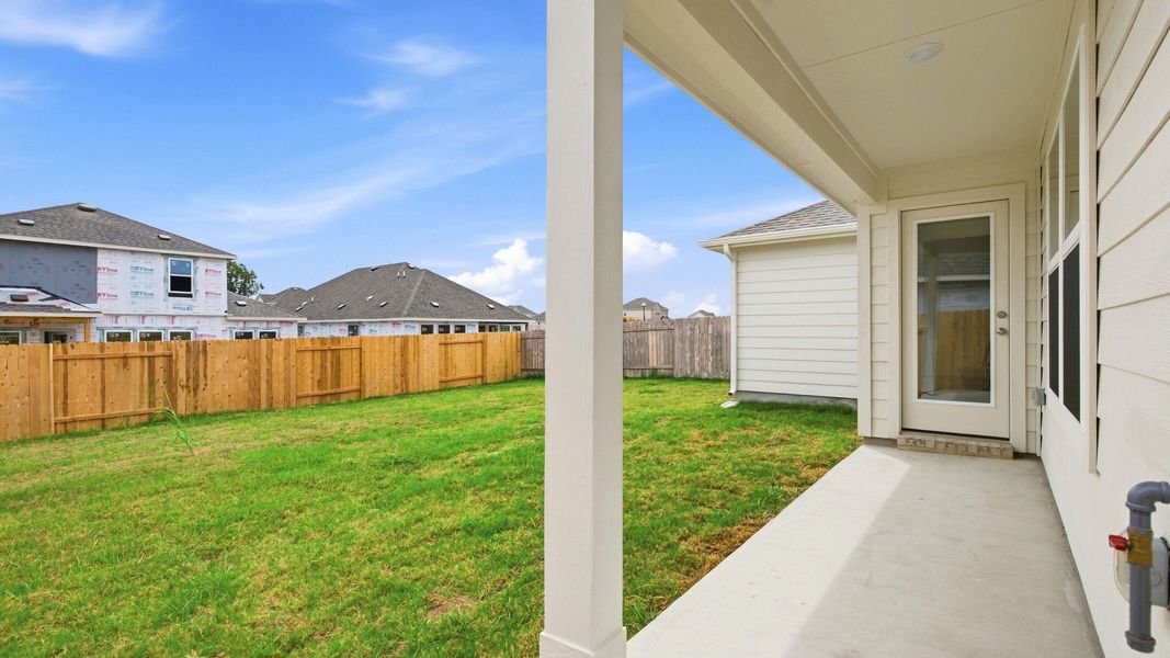 Exterior details and patio area of a home in Infinity Square, Kyle (Image 3).
