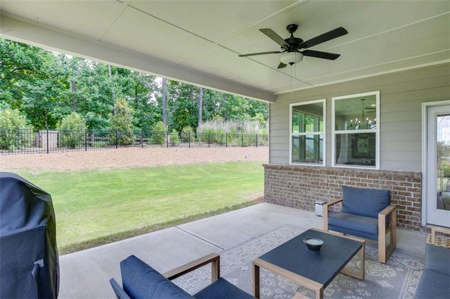 Exterior details and patio area of a home in Overlook at Lanier, Buford (Image 27).