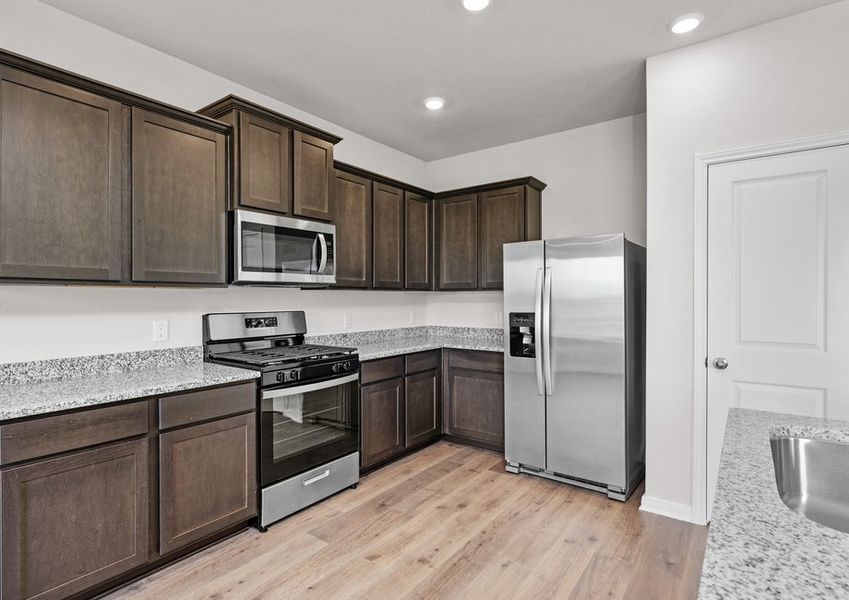 The kitchen has energy-efficient, stainless-steel appliances. The kitchen has energy-efficient, stainless-steel appliances.
