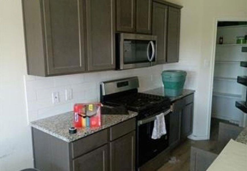 Furnished interior view inside a new home in Winchester Crossing, Princeton (Image 4).