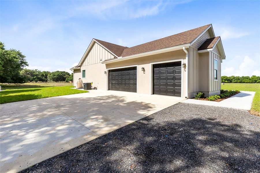 Front exterior of a new home in , Yeehaw Junction, FL, highlighting curb appeal (Image 23).
