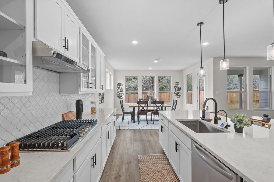 Representative furnished interior of a home built from the The Belmont G w/ 3-Car Garage by Davidson Homes LLC in Potranco Oaks, Castroville (Image 16). Representative furnished interior of a home built from the The Belmont G w/ 3-Car Garage by Davidson Homes LLC in Potranco Oaks, Castroville (Image 16).