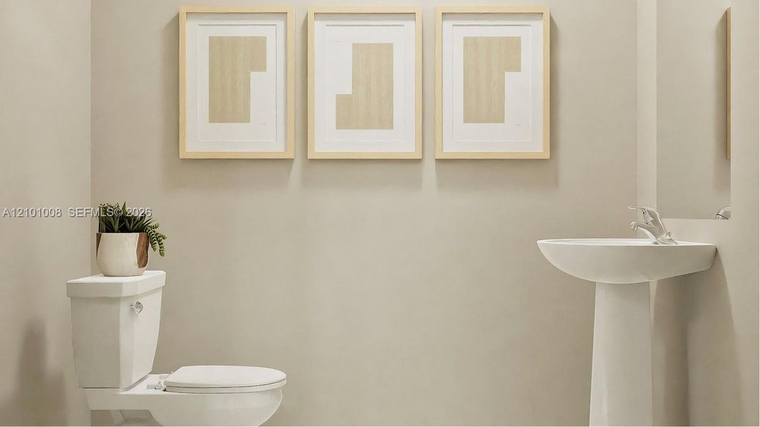 Centrally located on the first floor is a powder room to provide convenience and functionality to the home. Centrally located on the first floor is a powder room to provide convenience and functionality to the home.